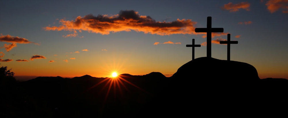 A serene and solemn depiction of the crosses at sunrise, symbolizing the spiritual resurrection at Easter.